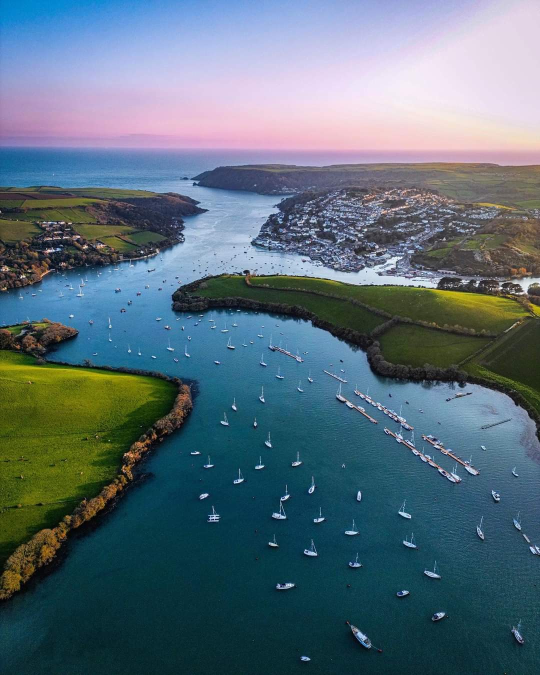 Aerial view over Salcombe harbour and moored boats